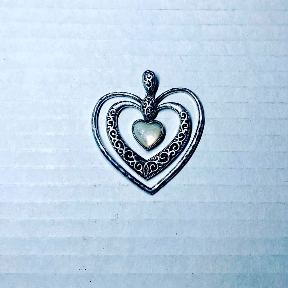 Silver vintage antique heart pendant.